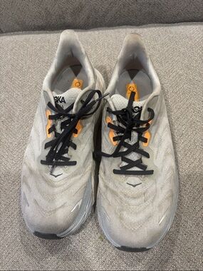 Hoka Men's Running Shoes in Light Gray with Orange Accents